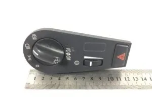 Volvo headlight switch with signaling function and brightness adjustment