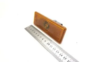 Orange led side indicator light with connector, approximate dimensions 12 cm x 4 cm