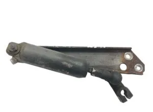 Metal support with cylinder for exhaust brake
