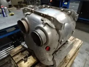 Exhaust catalytic converter and muffler daf