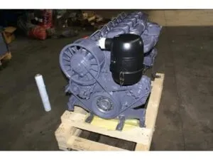 Deutz f6l912d engine 12 attached to wooden pallet in warehouse