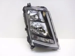 Right black headlight volvo 22239225