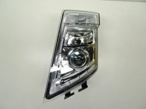 Left headlight volvo 21123523