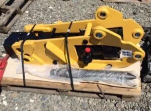 Picon backhoe with bolt-on attachment system, including picon spit